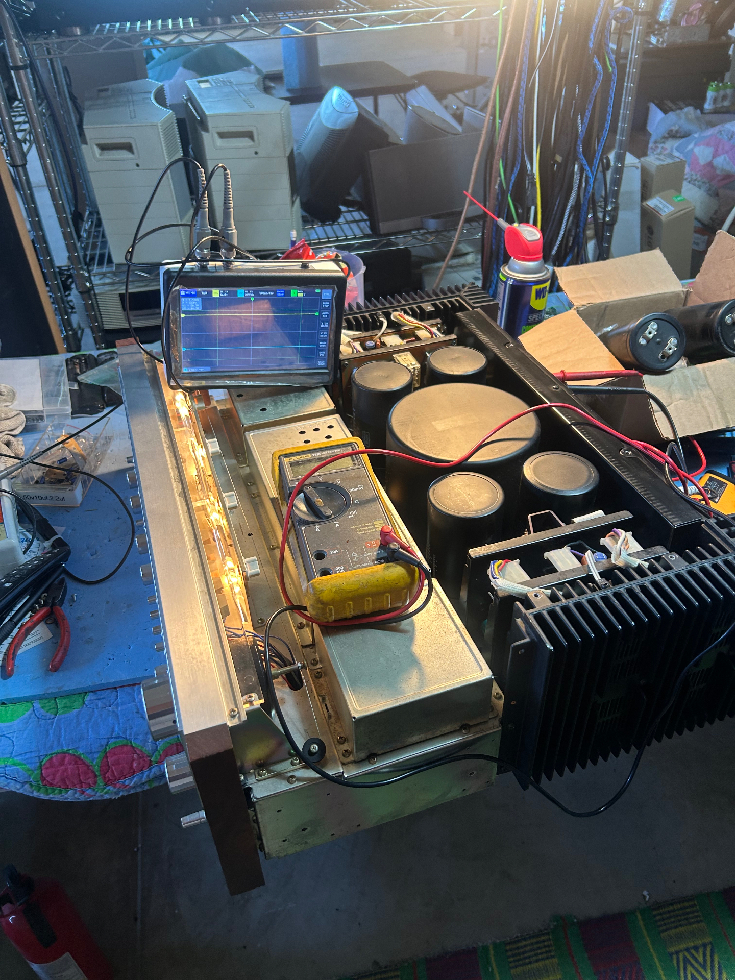 Power amplifier on the workbench with scope
